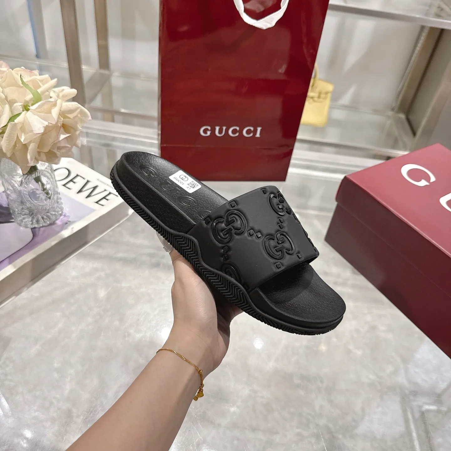 🅿️300💰 🌹Gucci official website Good Game slippers and sandals for men and women. In this special edition series, the acronym of the brand founder Guccio Gucci gives new meaning. In the gaming world, "GG" is a symbol of good sportsmanship and stands for "Good Game," which conveys the value system of the community. The modern acronym is a playful ode to the brand’s origins in the world of sports and leisure, illustrating how Gucci’s heritage continues to evolve. The parting greeting expresses the Gucci Good Game motto as the brand moves into new worlds, creating centers of play, self-expression, talent, freedom and individuality. Made with a rubber upper, these slippers are embellished with the collection's signature logo.  Rubber upper, unisex, G logo embossed, molded footbed, rubber sole, flat, made in Italy, sizes 36 to 46